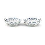 A PAIR OF WORCESTER BLUE AND WHITE CHESTNUT BASKETS, 18th century, of circular form,