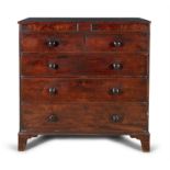 AN EARLY VICTORIAN MAHOGANY CHEST, of two short and three long drawers each fitted with turned