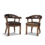A PAIR OF VICTORIAN OAK BUTTON BACK READING CHAIRS, each with horseshoe back and stuffed seat