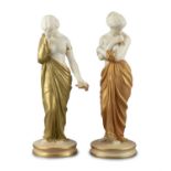 A PAIR OF ROYAL WORCESTER LUSTRE DECORATED FIGURES OF JOY AND SORROW, by James Hadley,