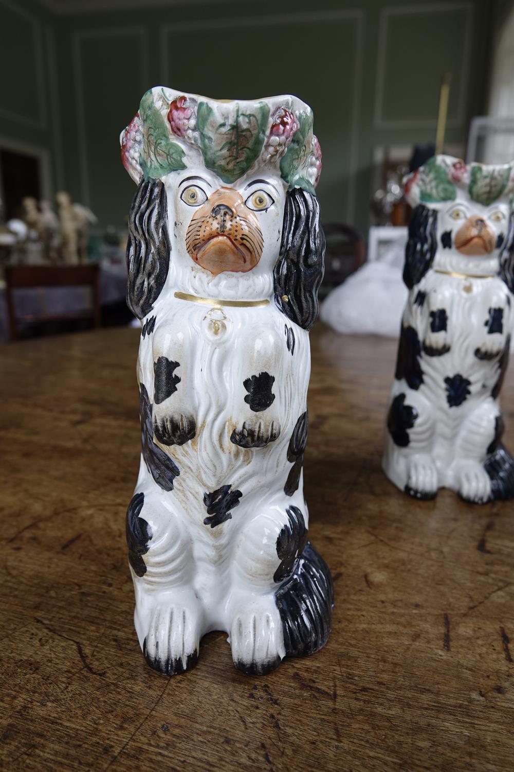 A PAIR OF 19TH CENTURY STAFFORDSHIRE JUGS, moulded in the form of spaniels. 26cm high; Together - Image 7 of 16