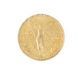 A MEXICAN GOLD 50 PESO COIN, the winged symbol of victory and the date 1821-1923, c.37.5g