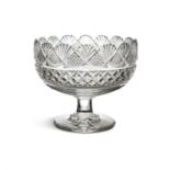 AN IRISH CUT GLASS DRUM SHAPED BOWL, 19th century, with fan cut rim, above hobnail and diamond cut