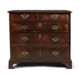 A GEORGE III WALNUT AND TULIPWOOD CROSSBANDED CHEST OF DRAWERS, the moulded rectangular top above