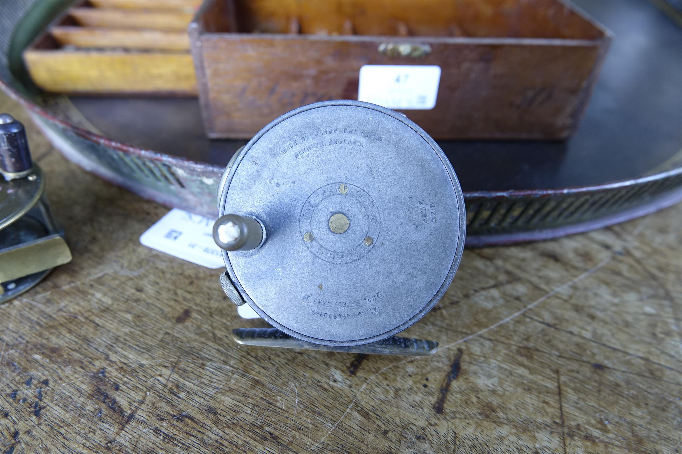 A COLLECTION OF FISHING AND ANGLING RELATED ITEMS, comprising: a Hardy 'Perfect Fly Reel' size - Image 4 of 20