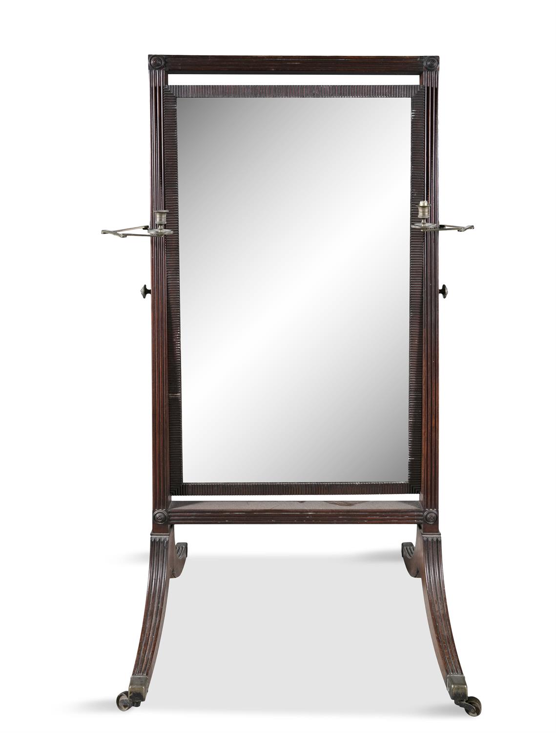 AN IRISH REGENCY CHEVAL MIRROR IN A REEDED FRAME, on outswept legs with square brass sock castors,