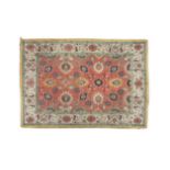 ***ADDITIONAL LOT*** A LARGE CAUCASIAN WOOL CARPET, the rectangular central field woven with