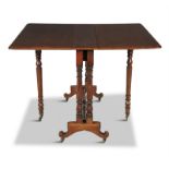 A VICTORIAN MAHOGANY RECTANGULAR DOUBLE-DROP LEAF YACHT TABLE, with moulded rim raised on turned