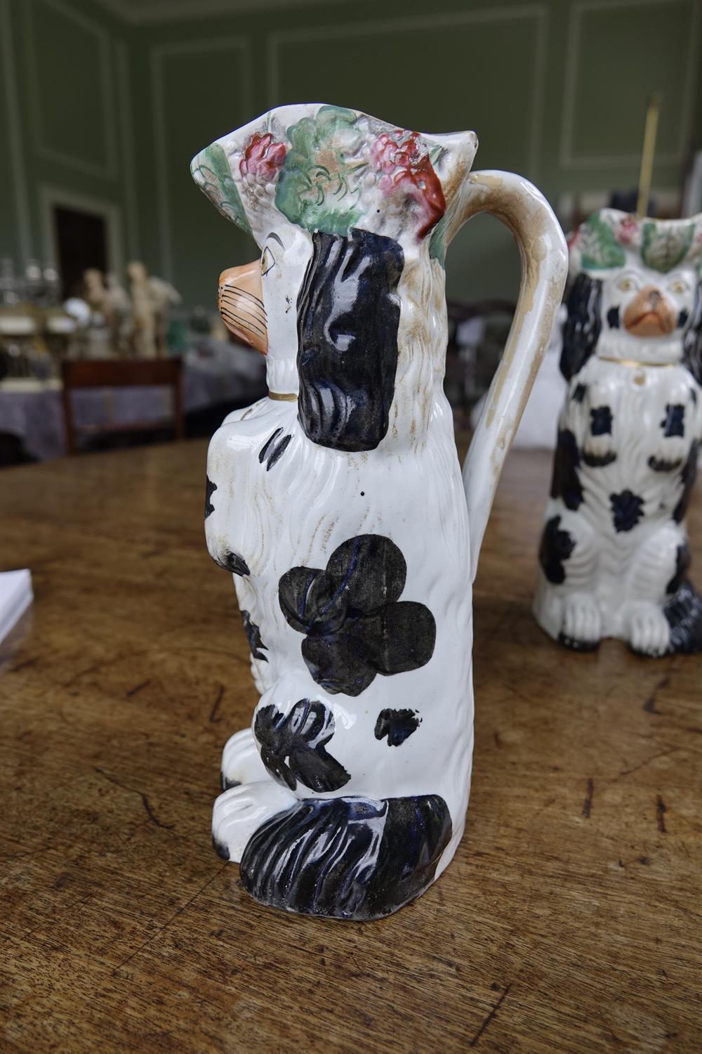 A PAIR OF 19TH CENTURY STAFFORDSHIRE JUGS, moulded in the form of spaniels. 26cm high; Together - Image 8 of 16