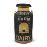 A PAINTED METAL MILK CHURN, the black ground decorated with 'Beehive Farm Dairy'. 68cm high
