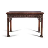 A 19TH CENTURY GEORGE III STYLE MAHOGANY RECTANGULAR SIDE TABLE, decorated with carved guilloche