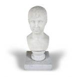 ITALIAN SCHOOL (19TH CENTURY) A Portrait Bust of a Young Boy Carrera marble, 42cm high On