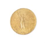 A MEXICAN GOLD 50 PESO COIN, the winged symbol of victory and the date 1821-1923, c.37.5g