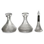 A PAIR OF 19TH CENTURY CUT CRYSTAL SHIPS DECANTERS, with stepped fluted decoration,