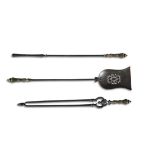 A SET OF THREE REGENCY STEEL AND BRASS FIRE IRONS, with cast brass baluster handles,