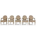 A SET OF FIVE FRENCH GILTWOOD FAUTEUILS IN LOUIS SEIZE TASTE, each with oval padded back and