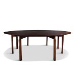 AN IRISH GEORGE III STYLE MAHOGANY HUNT TABLE, of usual oval form, with drop leaves raised on