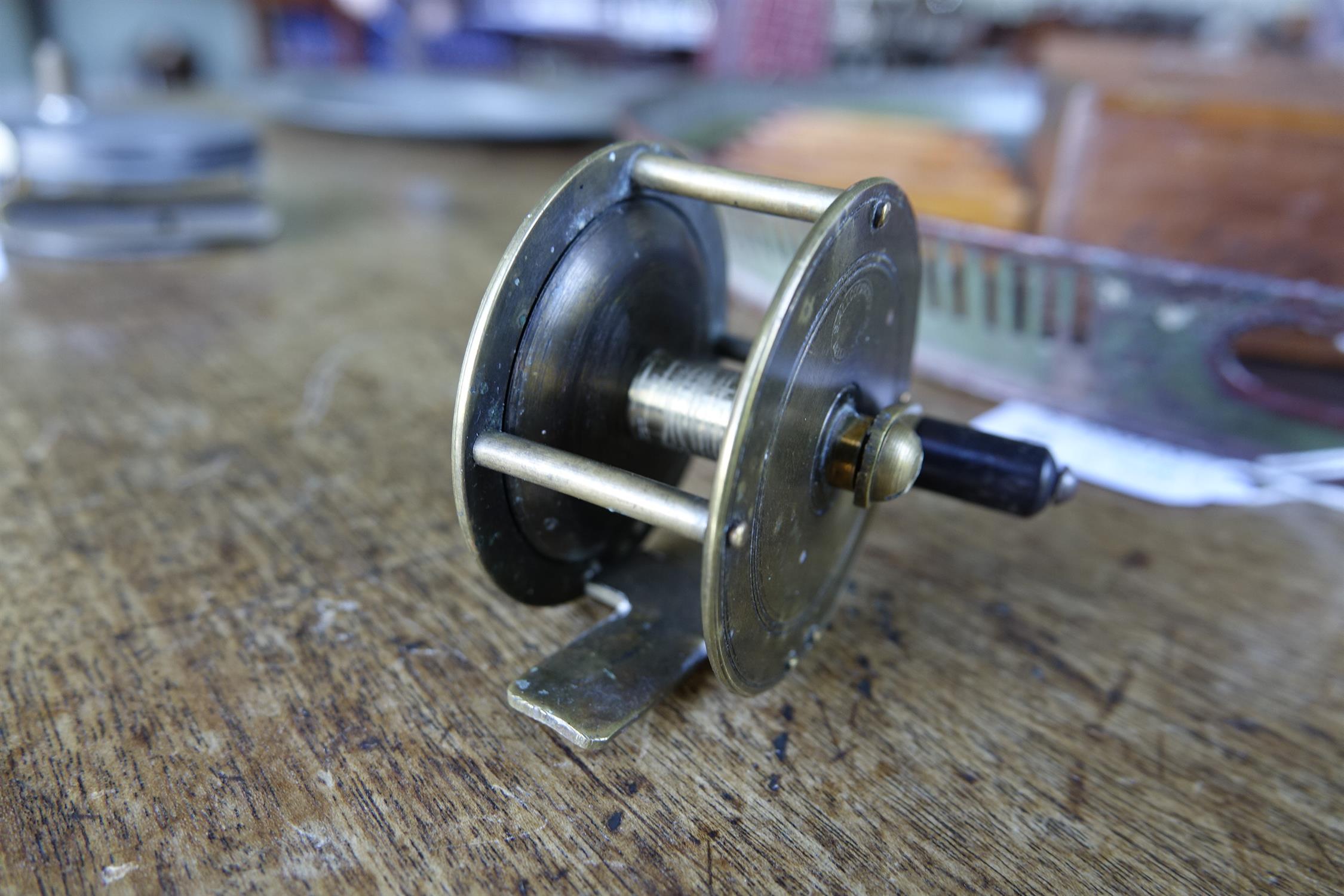 A COLLECTION OF FISHING AND ANGLING RELATED ITEMS, comprising: a Hardy 'Perfect Fly Reel' size - Image 15 of 20