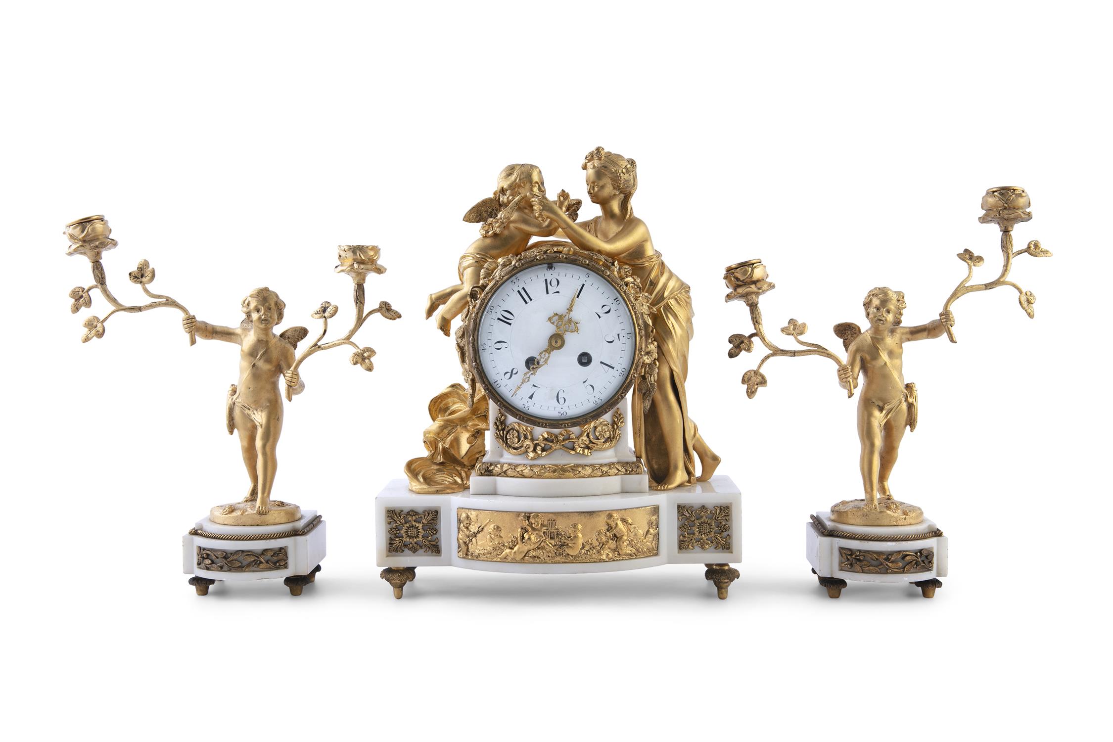 A FRENCH THREE PIECE GILT BRONZE AND MARBLE FIGURAL CLOCK GARNITURE, the clock with a classical