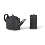 A WEDGWOOD BLACK BASALT WARE OVAL TEAPOT AND CYLINDRICAL SPILL VASE, decorated with neoclassical