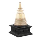 A RARE CEYLONESE IVORY RELIQUARY STUPA, Kandyan Period, 18th century, of traditional conical shape,