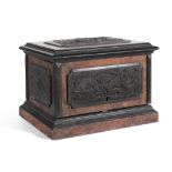 A BURR WALNUT AND EBONISED HUMIDOR, the casket with hinged cover enclosing fitted cigar slides and
