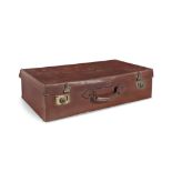 A LONG RECTANGULAR LEATHER GUN CASE, with brass protective corner mounts, fitted lined interior and