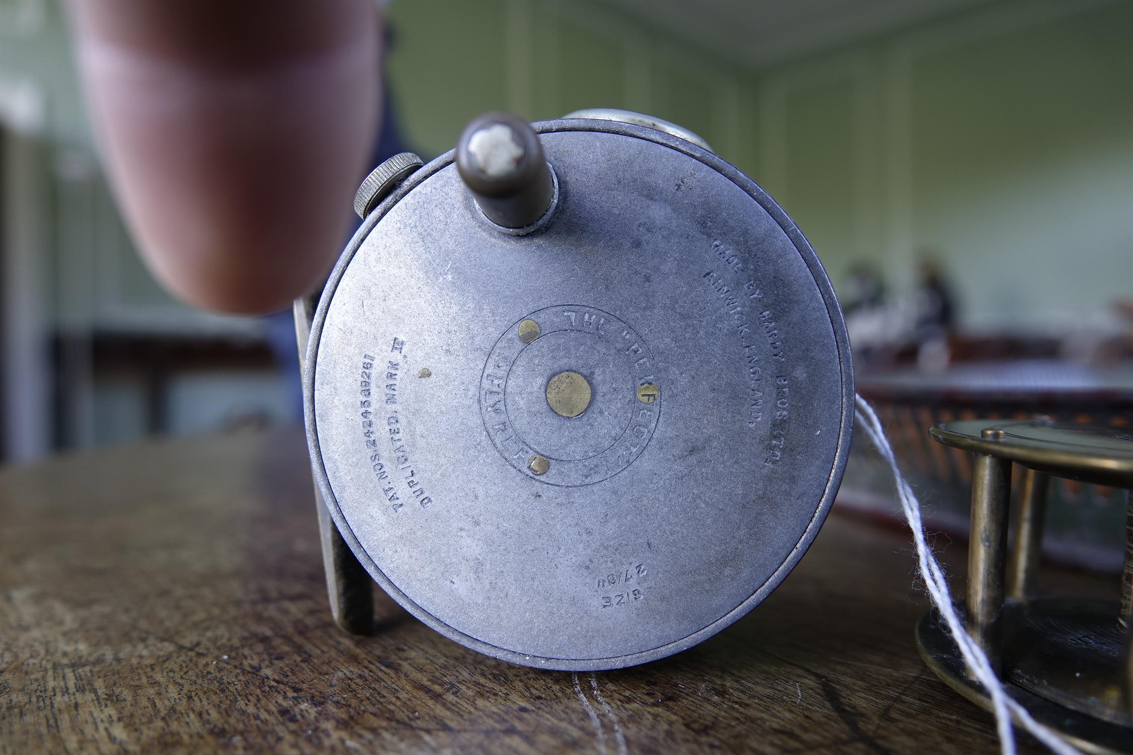 A COLLECTION OF FISHING AND ANGLING RELATED ITEMS, comprising: a Hardy 'Perfect Fly Reel' size - Image 5 of 20