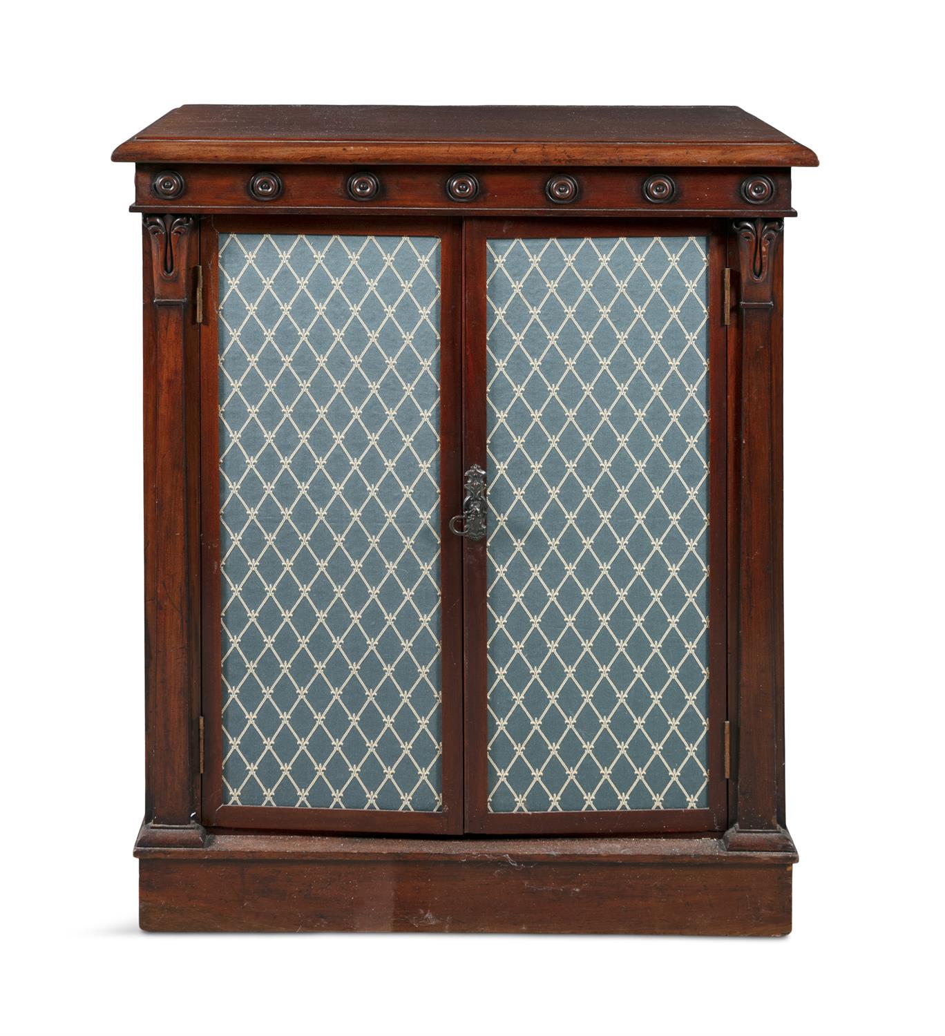 A GEORGE IV MAHOGANY RECTANGULAR TWO DOOR CABINET, with a frieze set with a band of roundels above