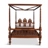 A VICTORIAN MAHOGANY FOUR POSTER BED, in 17th century style, having a cavetto cornice supported by