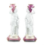 A PAIR OF VICTORIAN NEOCLASSICAL PORCELAIN FIGURES OF MALE AND FEMALE WATER CARRIERS,