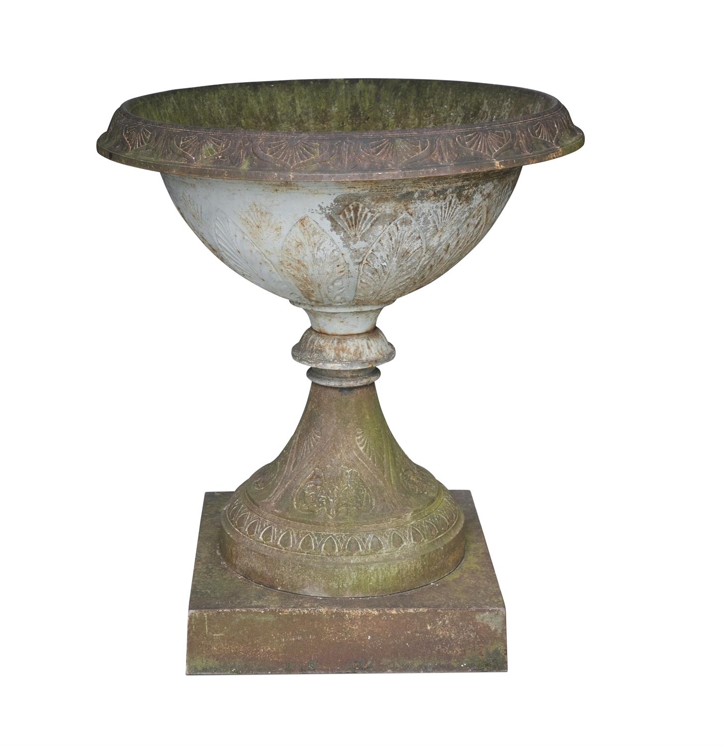 A LARGE VICTORIAN CAST IRON GARDEN URN, with everted circular rim, the body cast with upright