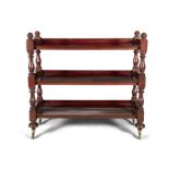 A VICTORIAN MAHOGANY RECTANGULAR THREE TIER DUMB WAITER, raised on turned baluster columns,