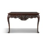 AN IRISH GEORGE III MAHOGANY CONSOLE TABLE, the later plain top with moulded rim above a leaf