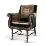 A REGENCY MAHOGANY FRAMED AND UPHOLSTERED LIBRARY CHAIR, with padded back and seat with lyre shaped