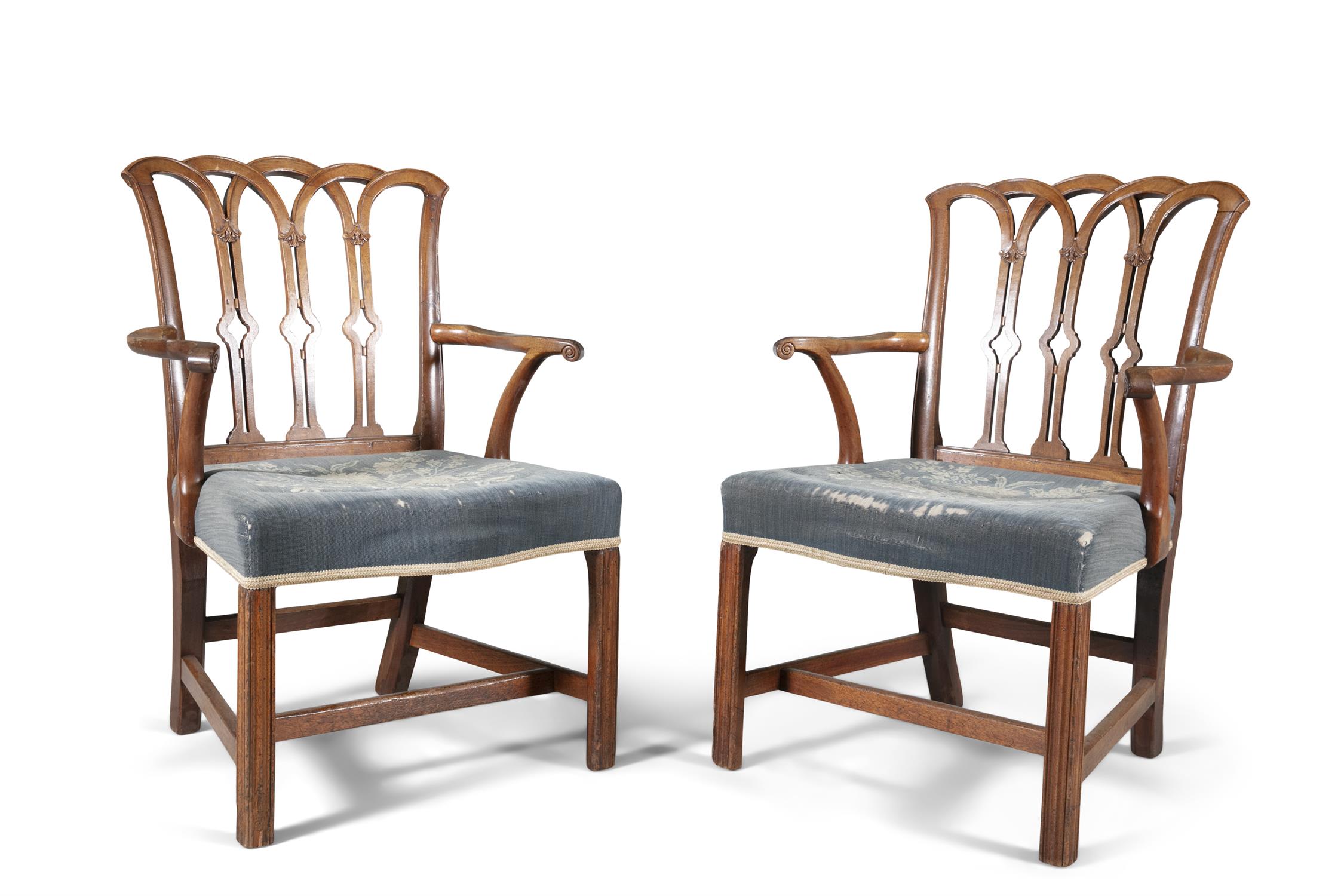 A PAIR OF GEORGE III PALE MAHOGANY FRAMED ARMCHAIRS IN THE GOTHIC TASTE, the pierced back having