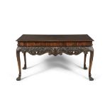 AN IRISH MAHOGANY SIDE TABLE, c.1740 the rectangular top with moulded rim, above a plain frieze and