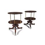 A PAIR OF IRISH REGENCY MAHOGANY AND BRASS CIRCULAR DUMBWAITERS, each with two circular dished