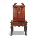 A FINE GEORGE II IRISH RED WALNUT AND MARQUETRY SECRETAIRE CABINET, C.1730/40, the top section with
