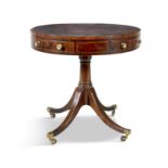 A GEORGE III INLAID MAHOGANY CIRCULAR LIBRARY TABLE, the top inset with tooled red leather,