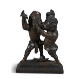 DUTCH SCHOOL (16/17TH CENTURY) Quarrelling Peasants Carved fruitwood group, 36 x 27cm On plinth