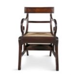 A GEORGE III REGENCY METAMORPHIC MAHOGANY LIBRARY ARMCHAIR, in the style of Morgan & Sanders,