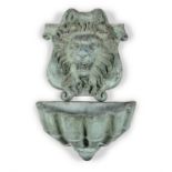 A GREEN PATINATED BRONZE GARDEN WATER FEATURE/ FOUNTAIN, in two parts with wall mounted cartouche