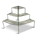 AN IRISH 19TH CENTURY WROUGHT IRON STRAPWORK THREE TIER CONSERVATORY PLANT STAND.