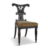 A WILLIAM IV MAHOGANY HALL CHAIR, the double scroll panel back covered with acanthus fronds,