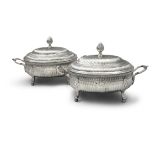 A FINE PAIR OF IRISH 18TH CENTURY SILVER TUREENS, by R. Holmes, Dublin 1765, of oval baluster form,