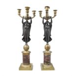 A PAIR OF FRENCH EMPIRE ORMOLU AND MARBLE FIGURAL CANDELABRA, modelled with a winged victory