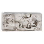 A PLASTER CAST TABLET, decorated in relief with Cupid on a horse-drawn chariot, after the antique.