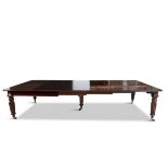 A VICTORIAN MAHOGANY RECTANGULAR TELESCOPIC EXTENDING DINING TABLE, with thumb moulded rim,