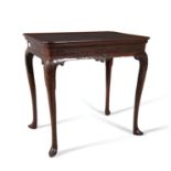 A GEORGE II IRISH MAHOGANY SILVER TABLE, c.1740, with cavetto top with re-entrant corners above a